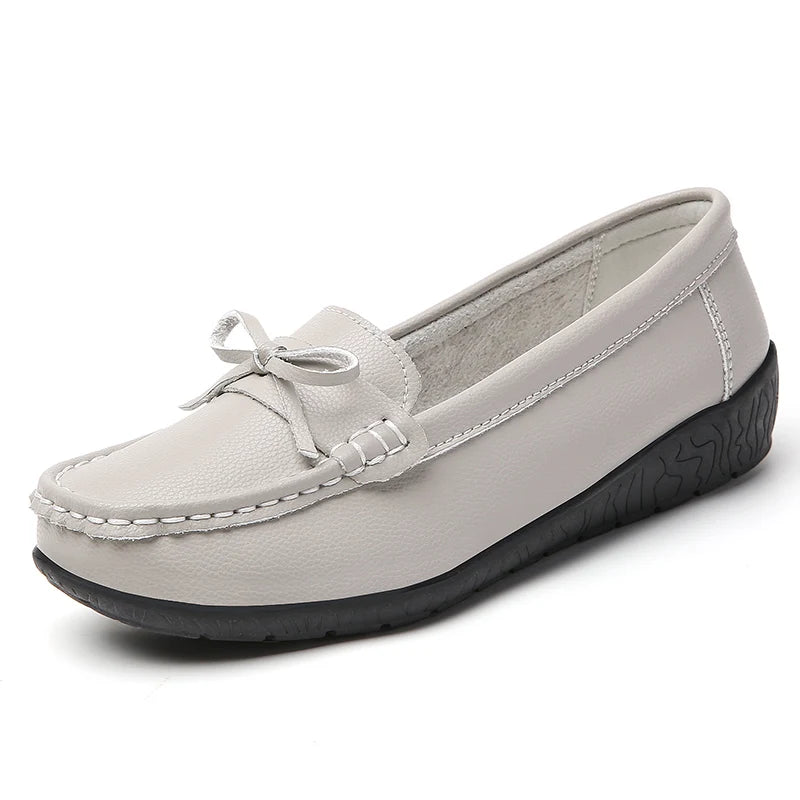 Stylish breathable leather flats for women – comfy casual wear.