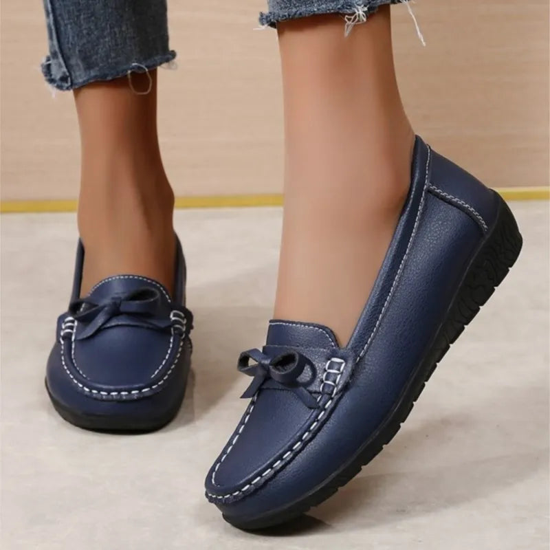 Stylish breathable leather flats for women – comfy casual wear.