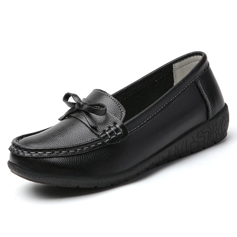 Stylish breathable leather flats for women – comfy casual wear.