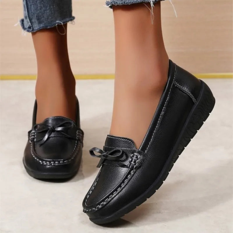Stylish breathable leather flats for women – comfy casual wear.